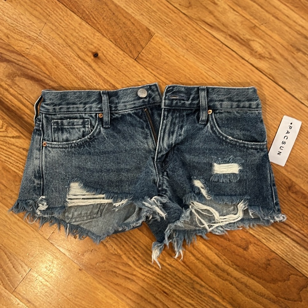 New with tags! PacSun jeans shorts--low-rise size 23. Perfect rips/frayed edges.
